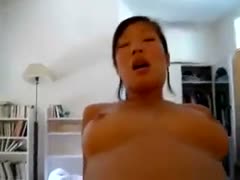 Desirable Like a cowgirl, the Asian white wife mounts a stiff shaft and pumps a large white dick.